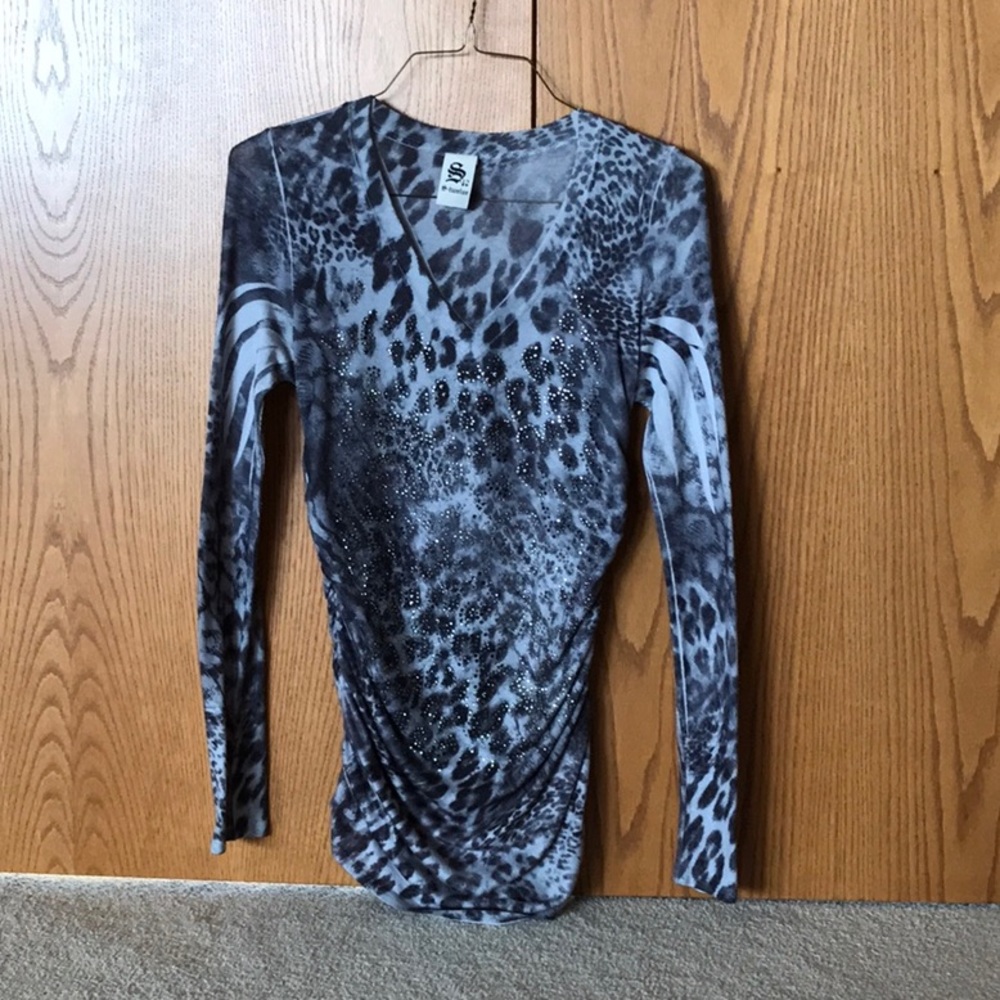 Ladies lightweight sweater with embellishments. Size medium.